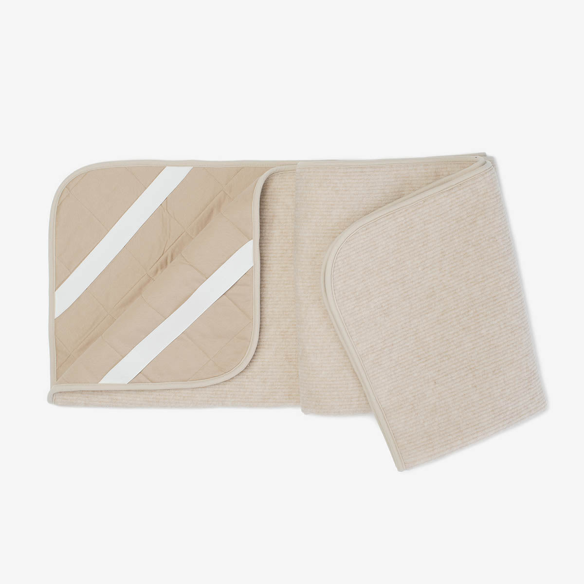 Wave merino underblanket folded open to show its underside