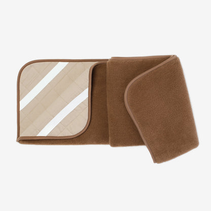 Camel and merino underblanket folded open to show its underside