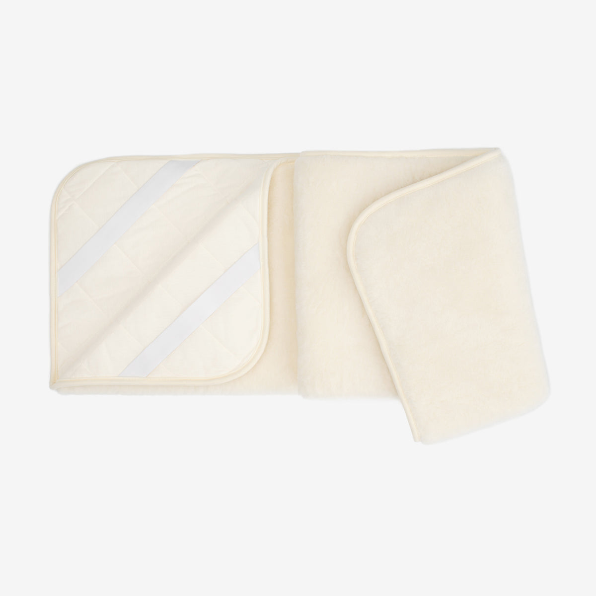 Merino and cashmere underblanket folded open to show its underside