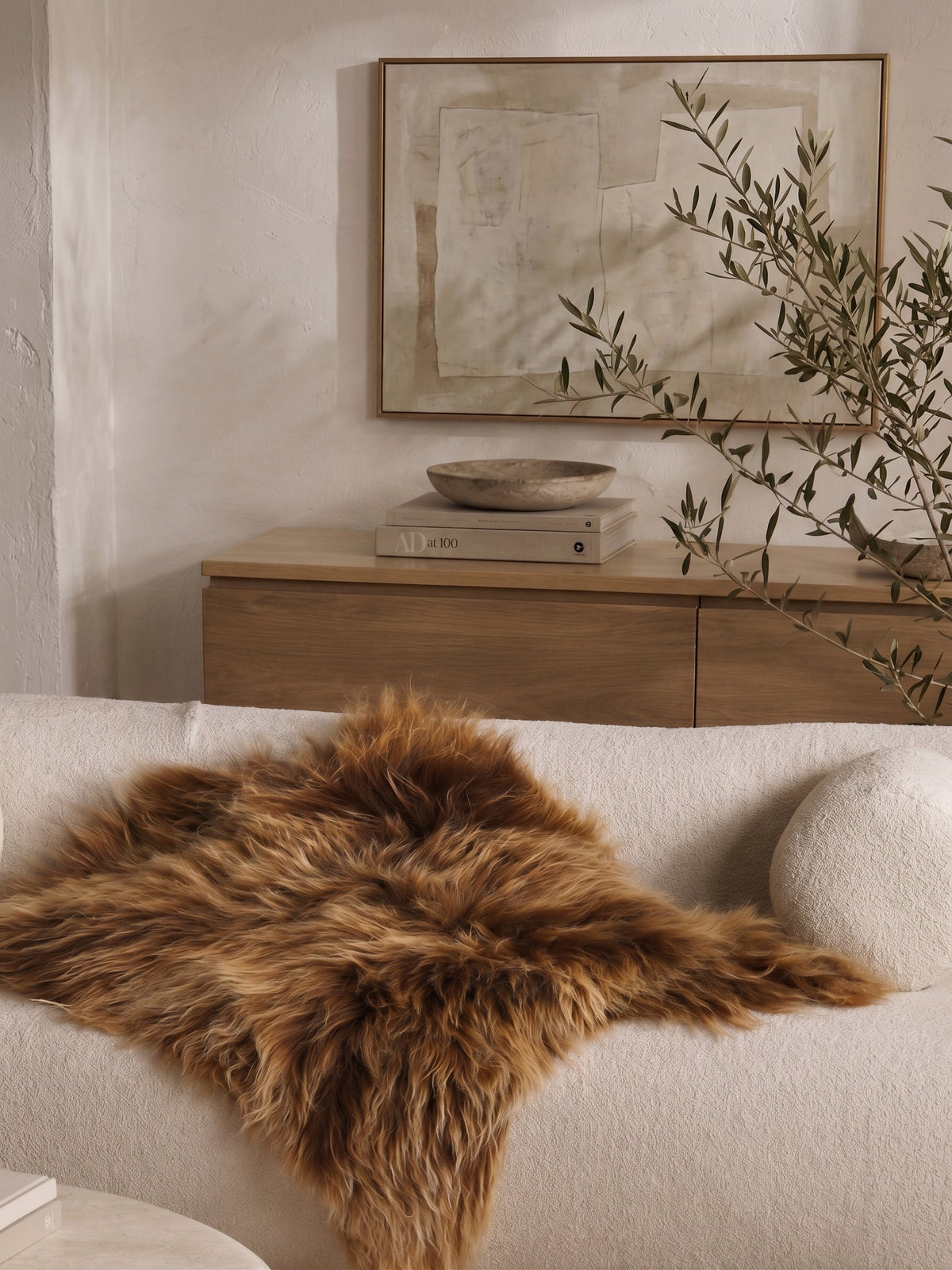 Brown Icelandic sheepskin laid on a bench