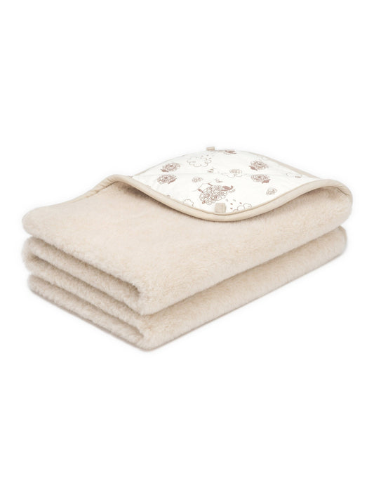Children's camel and merino blanket Cinnamon, 2-ply, folded, with its printed cotton side