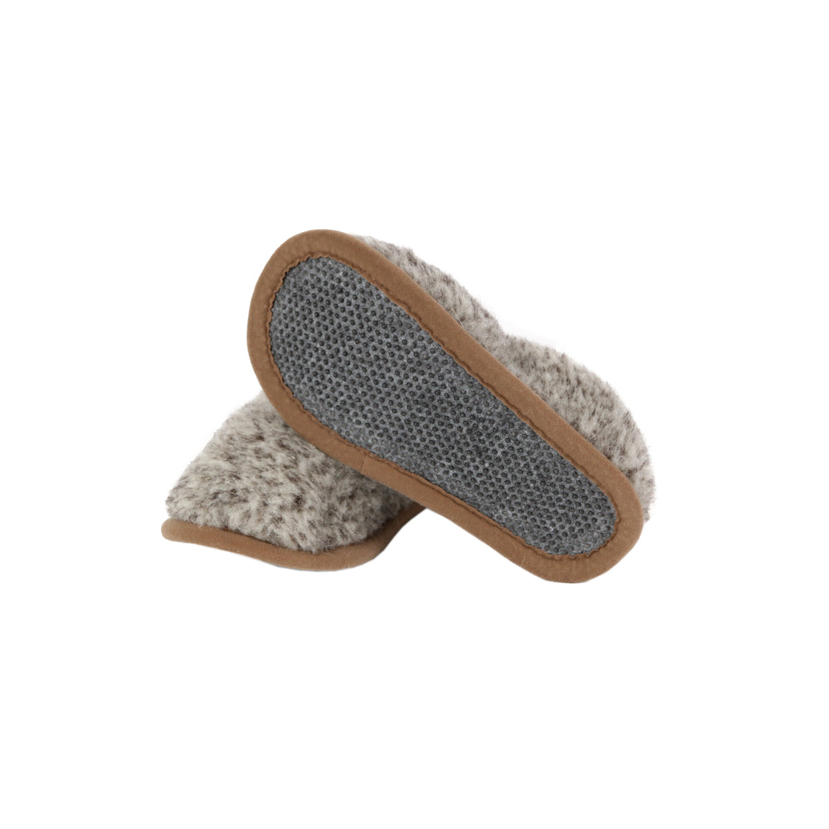 Dotted soles of the Tiger merino slippers