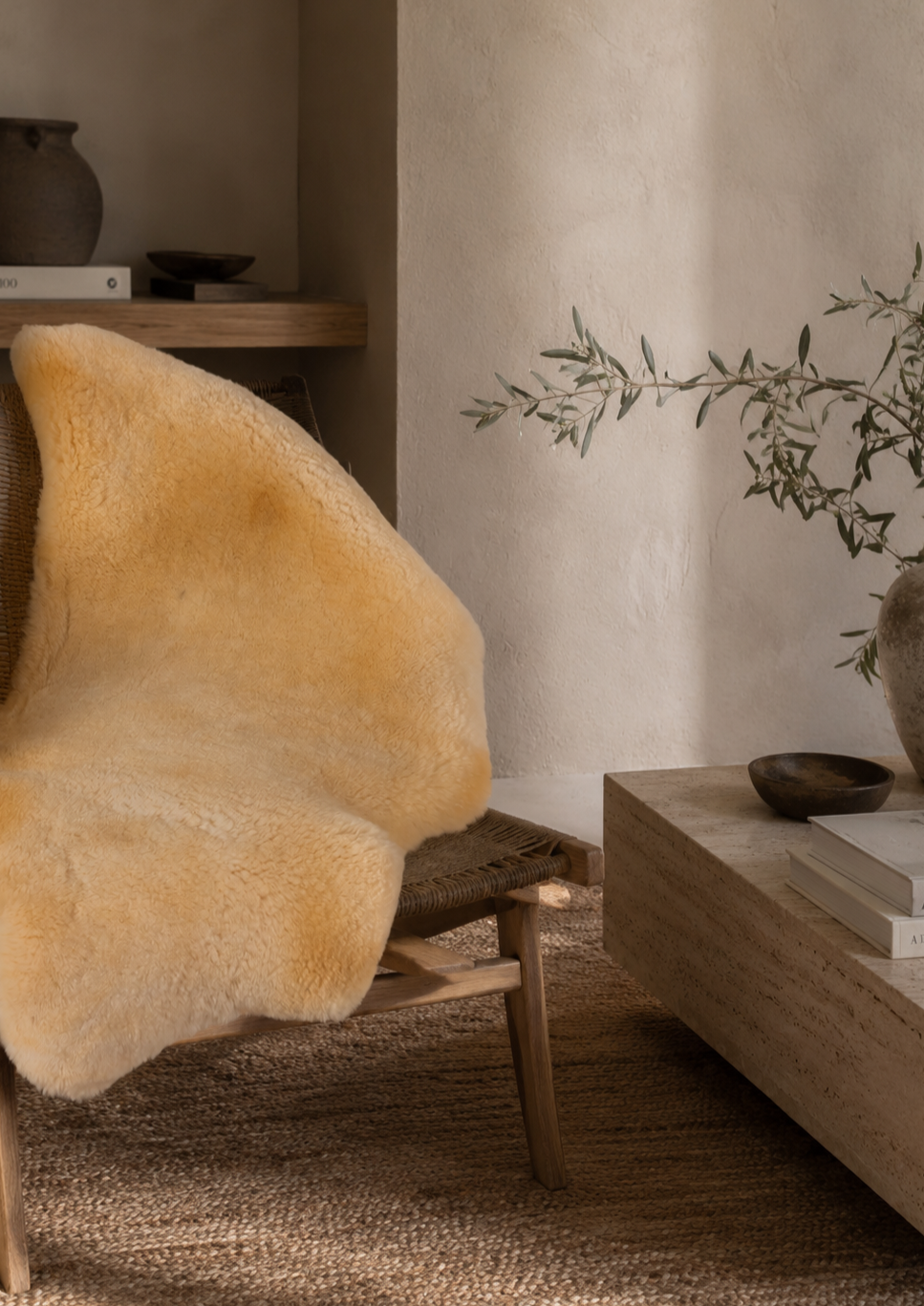 Medical sheepskin draped over a wooden sideboard