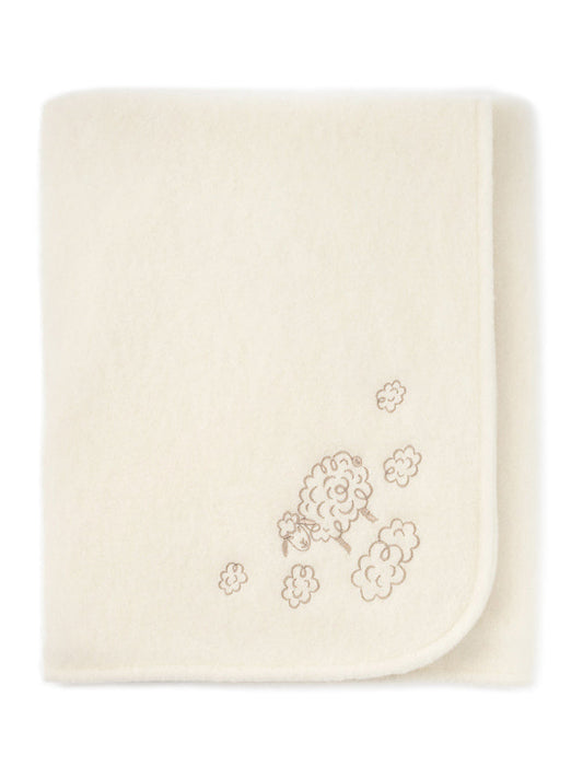 Merino baby blanket Sheep in ecru, folded, with embroidered sheep