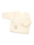Merino baby jacket Sheep in ecru, a wrap top with ties