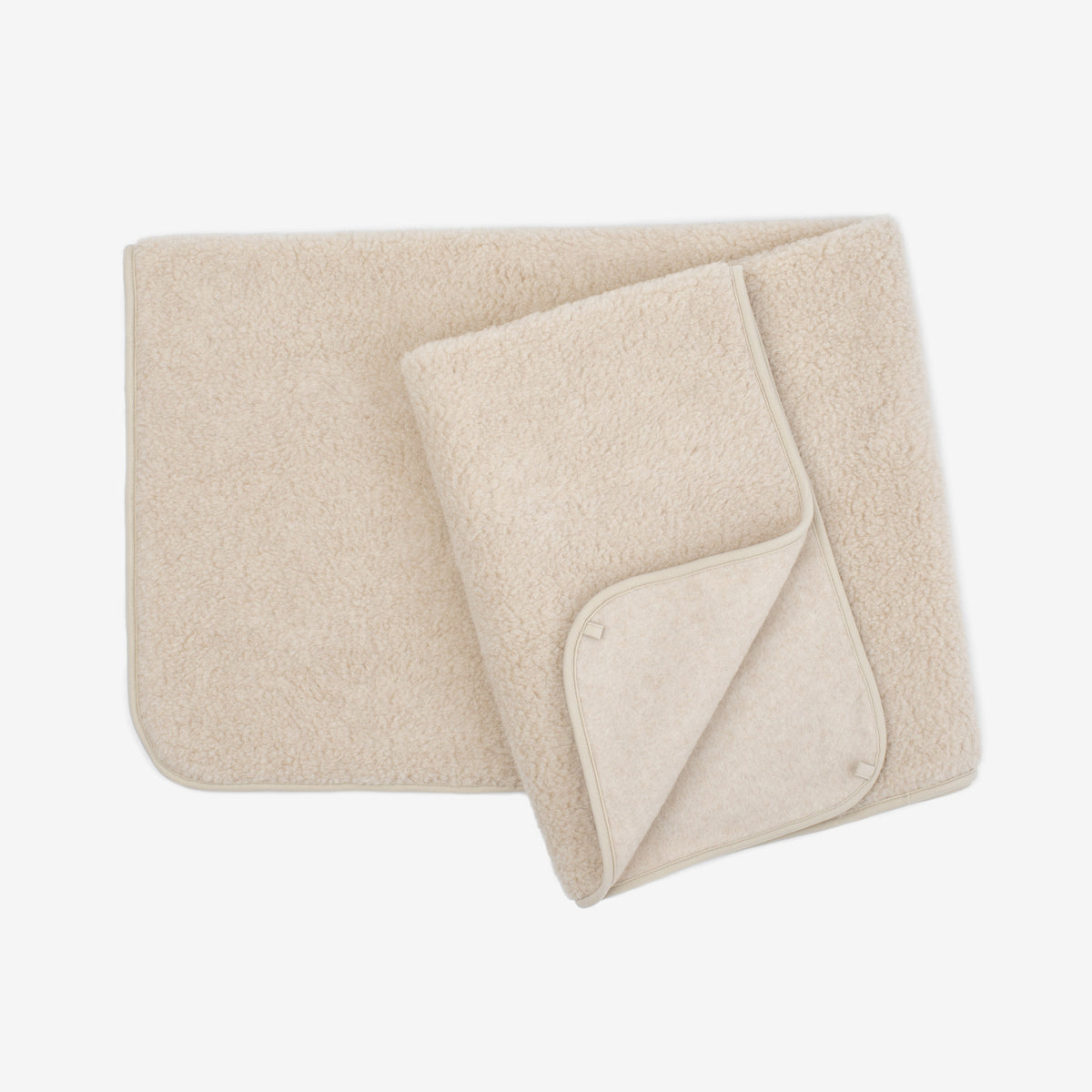 Almond 1-ply merino blanket folded open