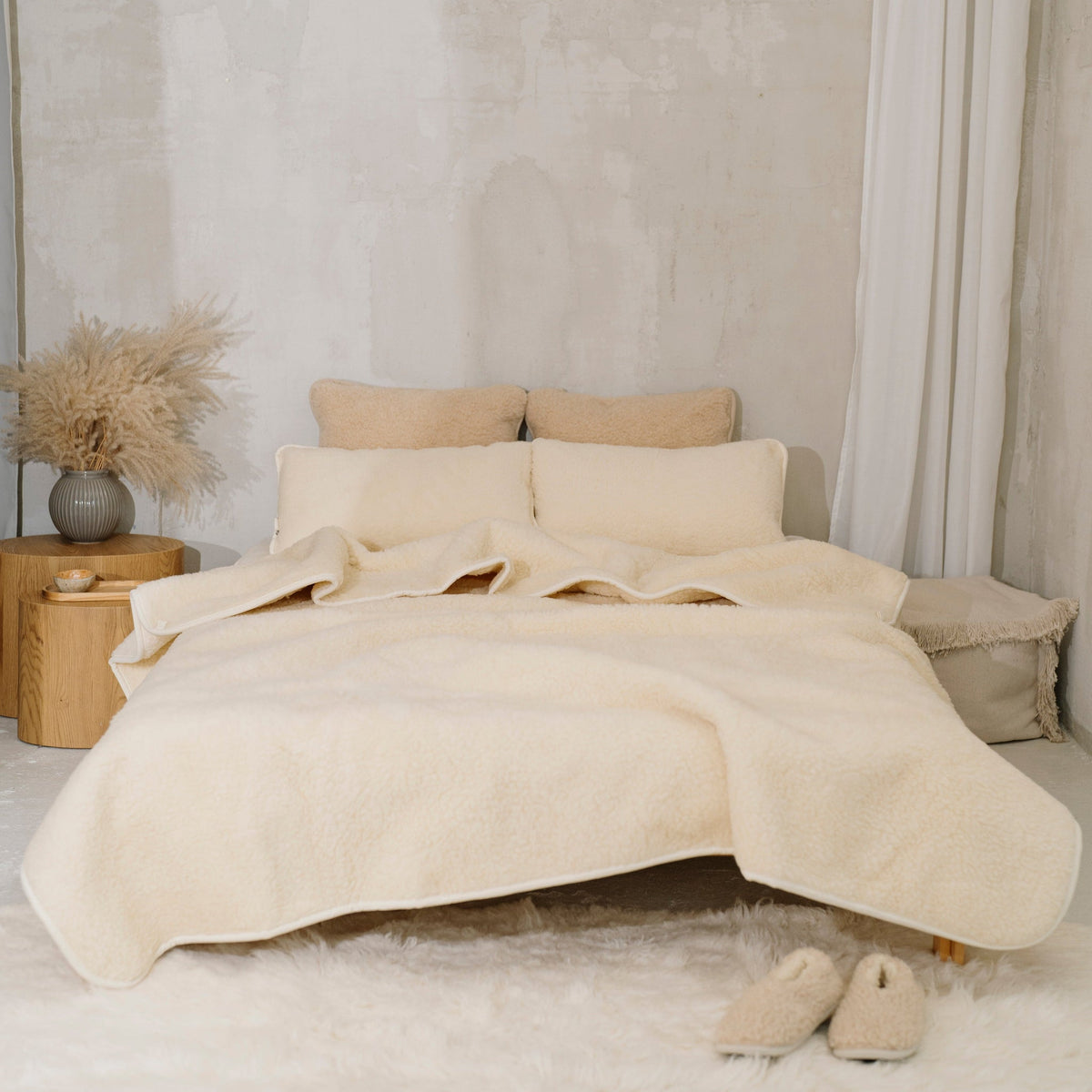 Luka merino blanket on a double bed