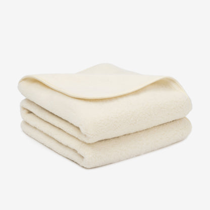Marzipan 1-ply merino blanket, folded
