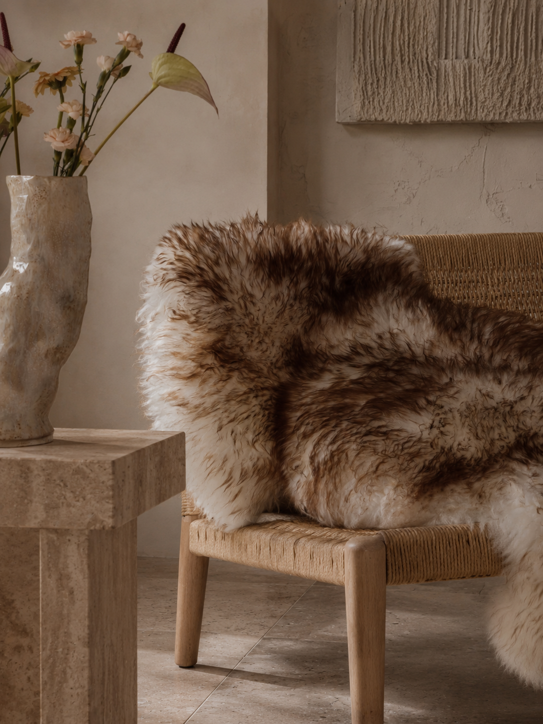 Mouflon sheepskin over a wooden chair, close up